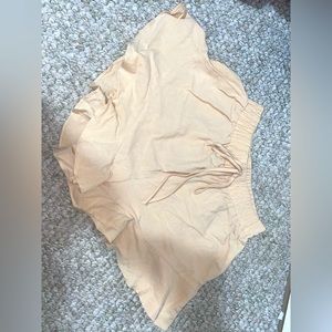 SHEIN Frenchy Ruffle Hem Solid Shorts